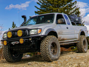 LED high beam with yellow glass mounted on a Toyota jeep - fitted by Strands Lighting Division - EAN: 7323030185343