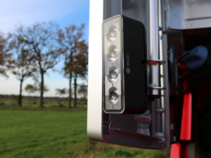 Truck made with LED work light on the side fender